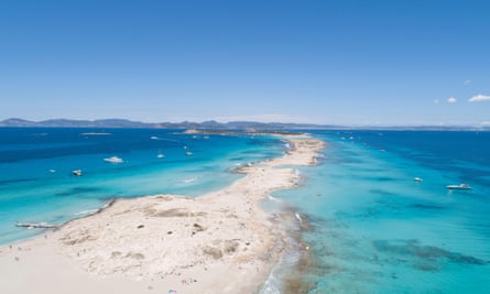 illetas, formentera beach seen from drone with turquoise and crystalline sea and Ibiza in the background