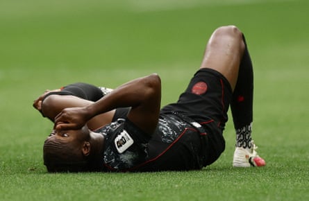Canada’s Ismaël Koné on the ground after sustaining a broken leg against Qatar.
