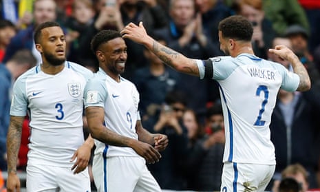 Jermain Defoe (centre) celebrates with Ryan Bertrand (left) and Kyle Walker after his opening goal for England against Lithuania.