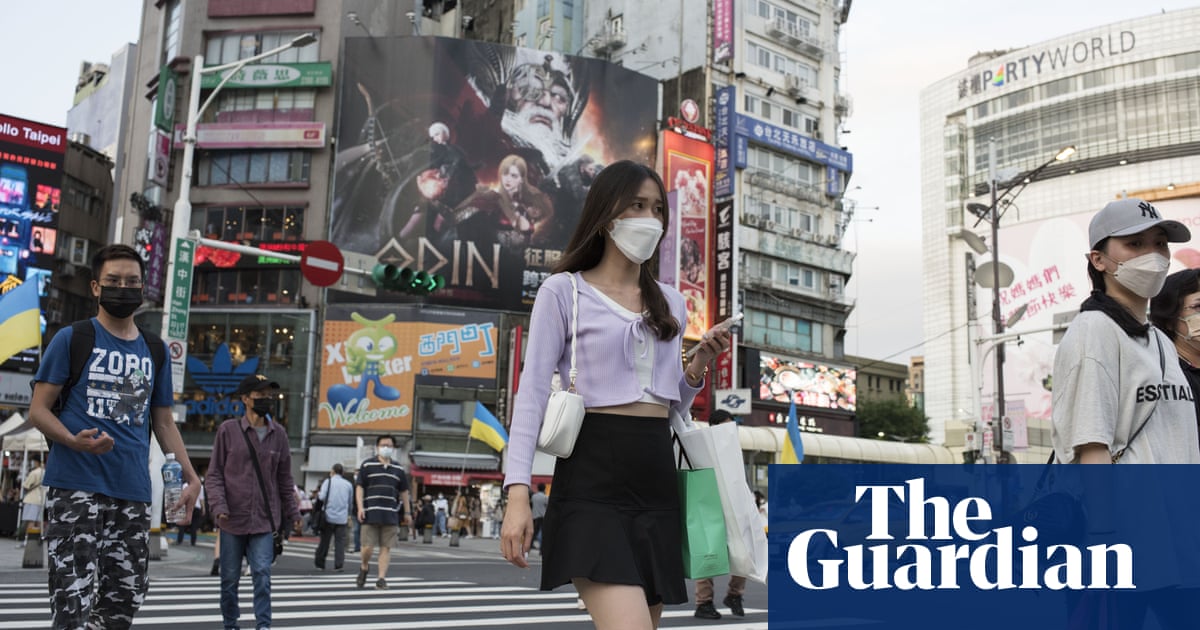 Once a zero-Covid poster child, Taiwan learns to live with the virus - The Guardian