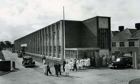 Workers arrive for their shift at the East Kilbride Rolls-Royce plant in 1953