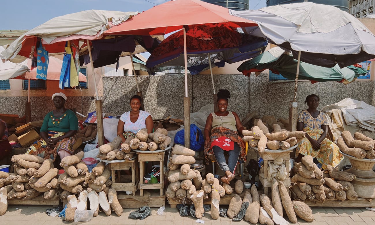 Felicia Appiah, Rita Oboh and two other yam traders at Kaneshie market in Accra