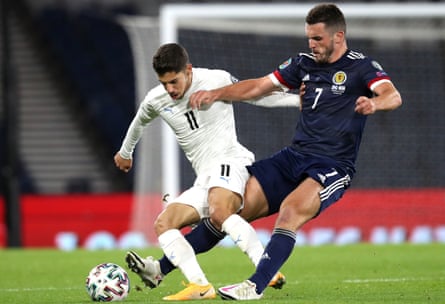 Israel’s Manor Solomon and Scotland’s John McGinn battle for the ball at Hampden Park in the Euro 2020 play-offs