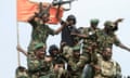 SUDAN-CONFLICT-POLITICS<br>Members of Sudan's armed forces take part in a military parade held on Army Day in Gadaref on August 14, 2024. (Photo by AFP) (Photo by -/AFP via Getty Images)