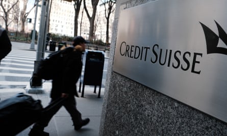 People walk by the New York headquarters of Credit Suisse on 15 March 2023 in New York City.