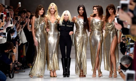 Carla Bruni, Claudia Schiffer, Naomi Campbell, Cindy Crawford, Helena Christensen and Donatella Versace walk the runway at the Versace show during Milan Fashion Week Spring/Summer 2018.