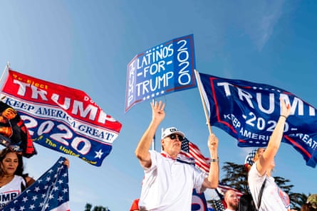 Donald Trump supporters hold during a rally in Beverly Hills, California, on Saturday.