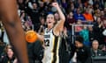 Caitlin Clark celebrates after defeating LSU in the NCAA Tournament Elite Eight