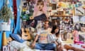 Sarfraz Manzoor and his daughter Leila sitting on the bed in her bedroom, the wall behind covered in pictures, including a large poster of Taylor Swift