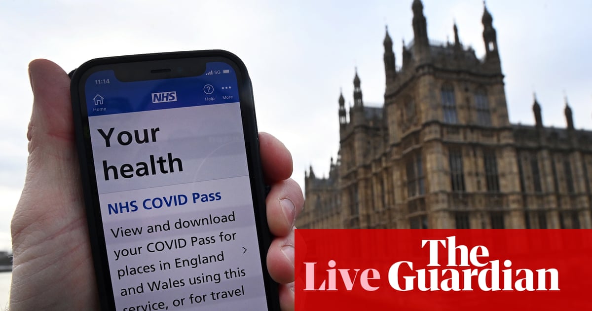 Coronavirus live: Covid passes take effect in England; Omicron ‘probably present in most countries’