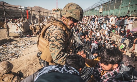 Troops mount an evacuation operation at Hamid Karzai international airport in Kabul in August 2021