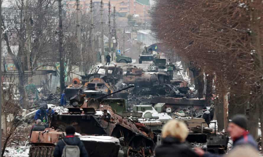Destroyed military vehicles on a street in the town of Bucha in the Kyiv region of Ukraine.