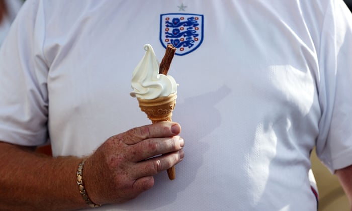 England v Norway: Women’s Euro 2022 – live! | Women's Euro 2022 6 An England fan holds a 99 flake ice cream in front of his shirt.