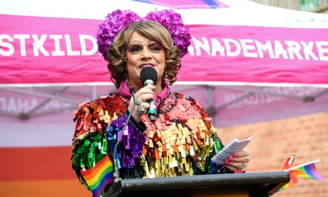 Dolly Diamond speaking into a microphone