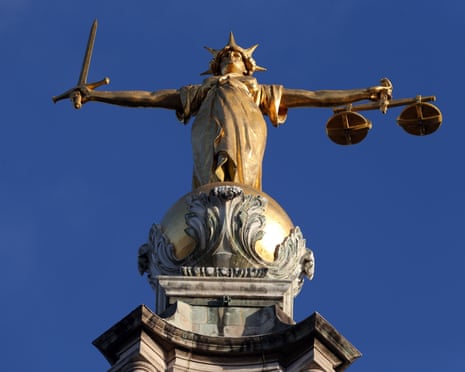 The statue of Lady Justice on top of the central criminal court building in London.