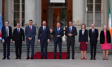 Simon Harris (L) and Pedro Sánchez (3rd left) among other EU leaders meet in Warsaw, Poland, on 11 April.