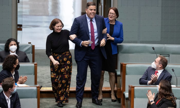 The new Speaker, Milton Dick, is dragged to the chair by the member for Bendigo Lisa Chesters and the member for Macquarie Susan Templeman.