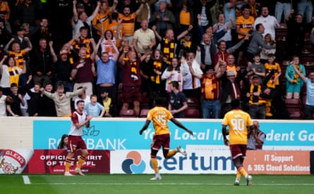 Motherwell’s Emmanuel Longelo celebrates with fans after scoring their equaliser