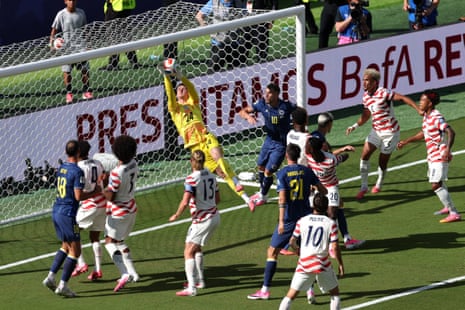 Matt Freese is alert to the danger as he clears the corner.