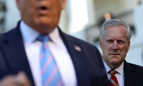 Mark Meadows, former White House chief of staff, stands behind Donald Trump on 29 July 2020.