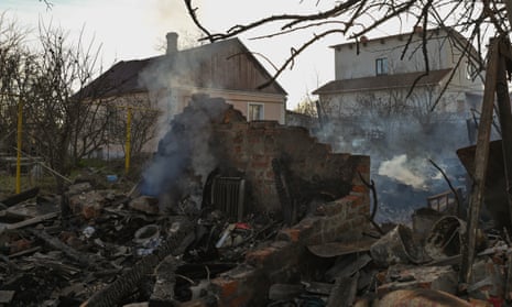 Smouldering ruins of a house near Kherson shipyards seen after a missile attack on Wednesday.