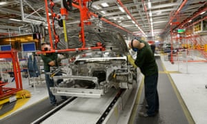 Workers at the Jaguar Land Rover factory in Castle Bromwich, West Midlands.