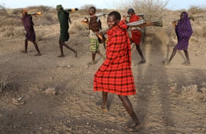 Baragoy, Kenya
Turkana tribesmen protect their cattle from rival Pokot and Samburu tribesmen.