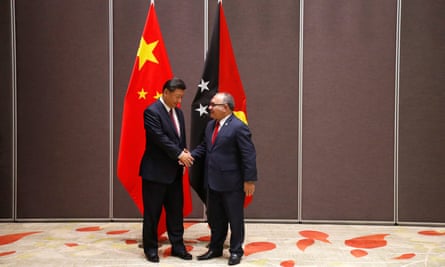 Papua New Guinea’s PM Peter O’Neill shakes hands with China’s President Xi Jinping