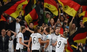 Germany players celebrate Alexandra Popp's winning goal.