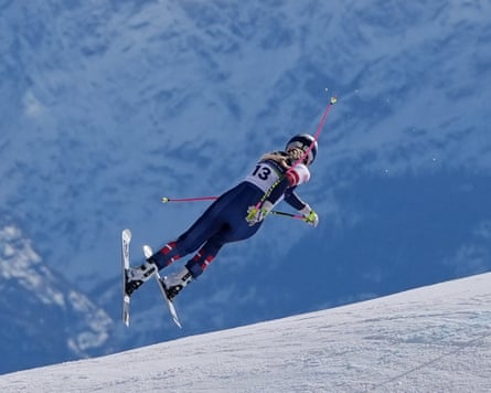 Lindsey Vonn crashes early successful her tally down nan Olimpia delle Tofane piste.