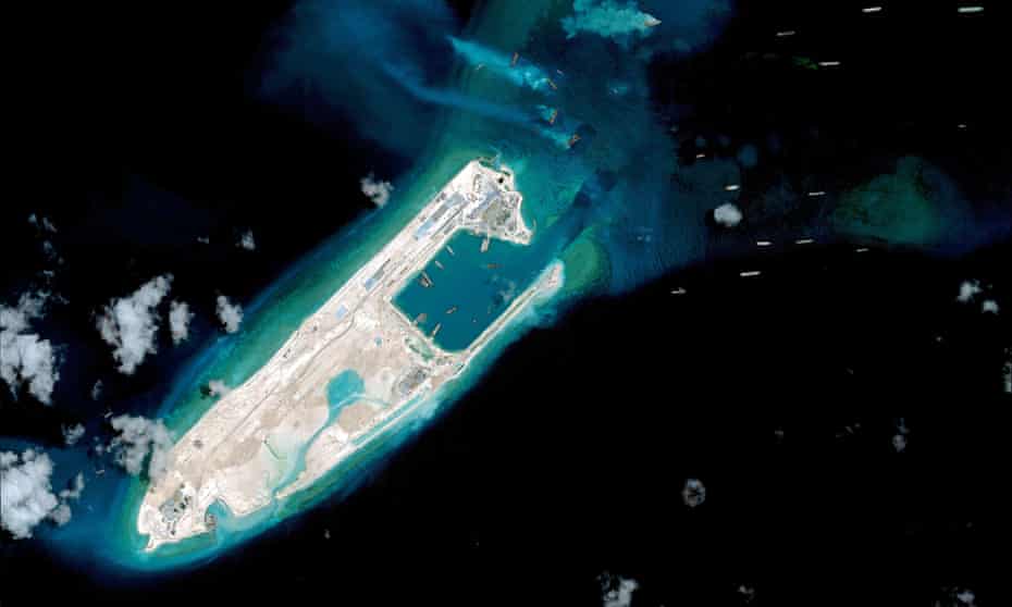 China has landed a plane at an airstrip at the top end of Fiery Cross Reef in the Spratly Islands in the disputed South China Sea. 