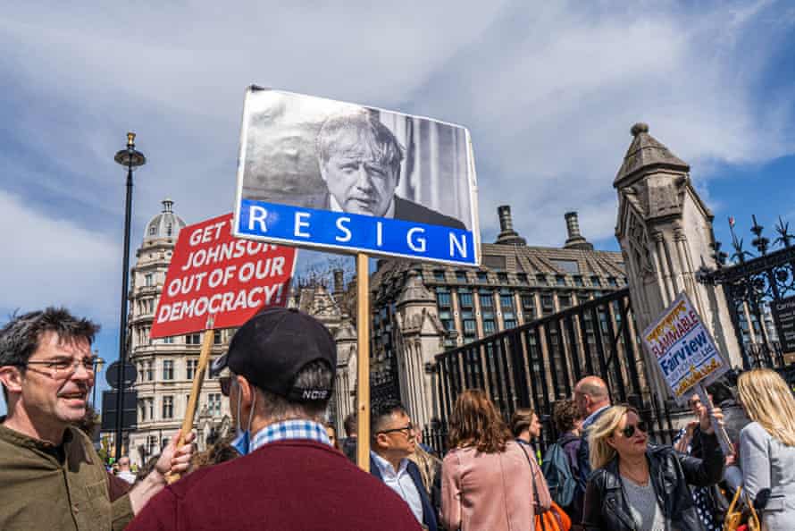 Anti-Johnson campaigners outside parliament today.
