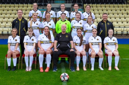 Dumbarton FC women’s team pose for a group shot with the coaching staff