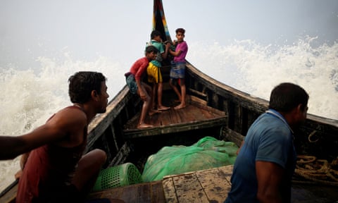 Waves hit a fishing boat crewed by Rohingya refugees in the Bay of Bengal near Cox’s Bazaar, Bangladesh