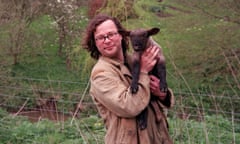 Hugh Fearnley Whittingstall holds a lamb in Return to River Cottage on Channel 4.