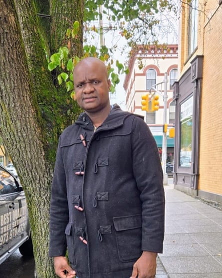 Man stands near tree