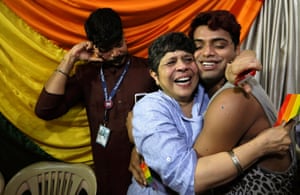 Activists in Mumbai embrace after the supreme court decision