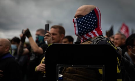 Proud Boys organizer recites the Pledge of Allegiance during a Proud Boys rally at Delta Park in Portland, Oregon on 26 September 2020.