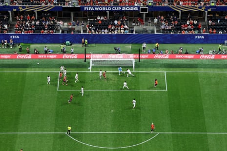 Marc Cucurella of Spain shoots at goal and it’s deflected in by Hassan Al-Tambakti of Saudi Arabia.