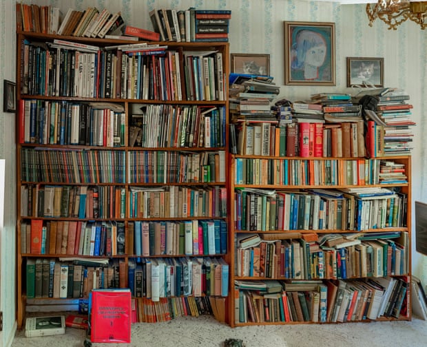 Large bookshelves packed with books in Gerald O’Brien’s home.