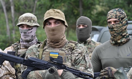 New members of the Dzhokhar Dudayev Chechen volunteer battalion take part in a training session in the Kyiv region on 27 August 2022, amid the Russian invasion of Ukraine.