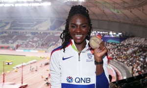 Dina Asher-Smith with her 200m gold medal at the Doha world championships last year.