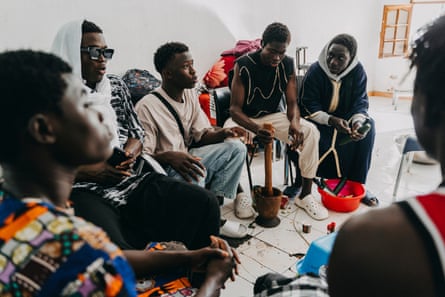 Senegalese teenagers at a community gathering in a house on Gran Canaria, Spain.