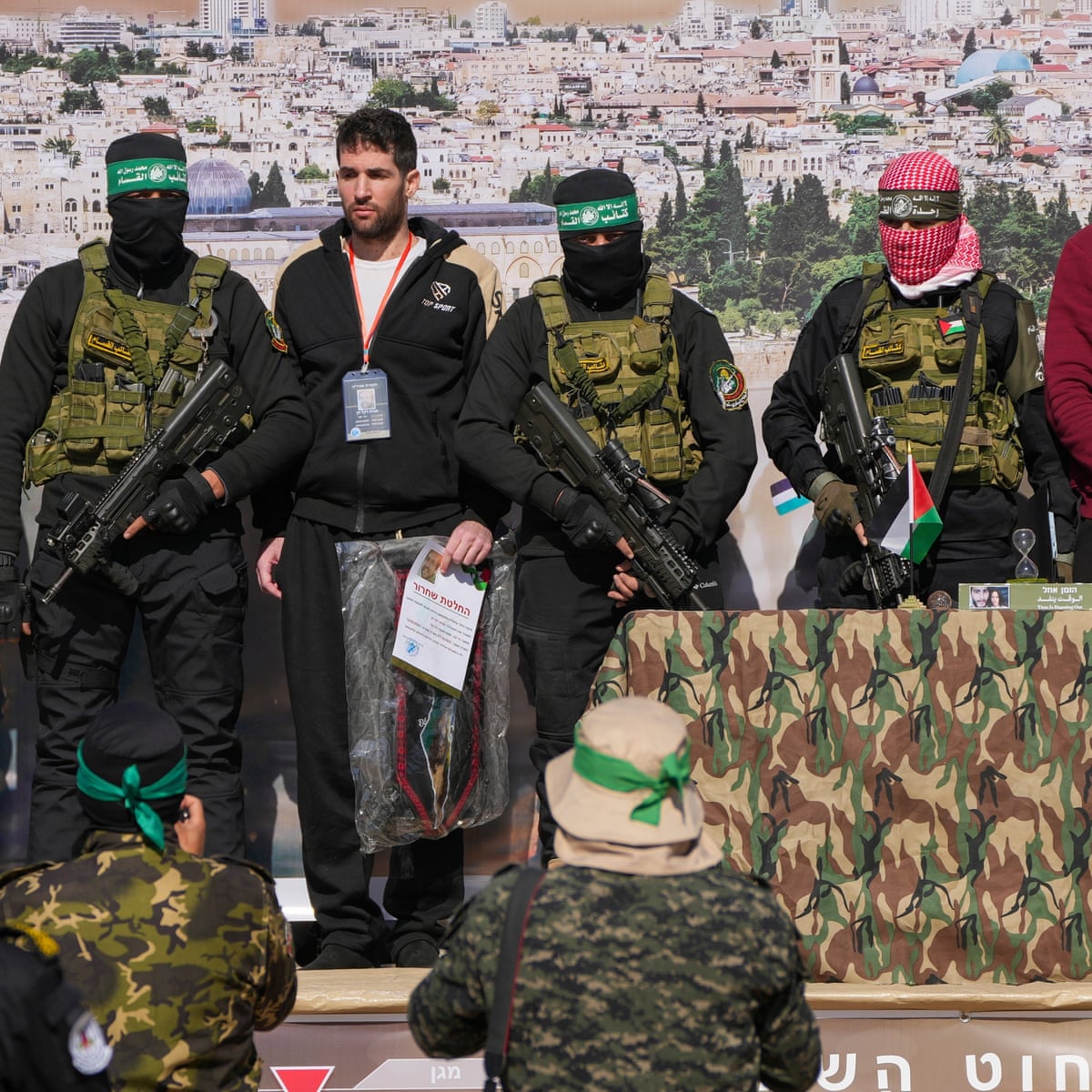 Three Israeli hostages released in Gaza after week of ceasefire tensions | Israel-Gaza war | The Guardian