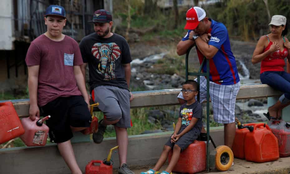Puerto Rico wait for fuel in Orocovis, outside San Juan. More than a third of Puerto Ricans are still struggling to live without drinking water.