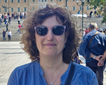 Katerina Andritsopoulou, standing in front of Greeceās parliament.