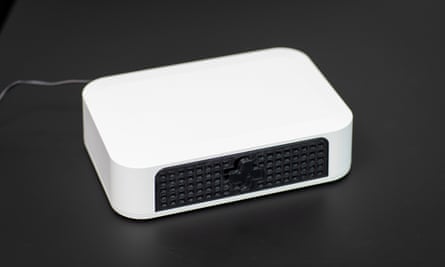 A white box resembling a internet modem or Freeview TV box