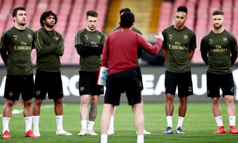 Unai Emery gets his message over to the Arsenal players in light training at the Stadio San Paolo.