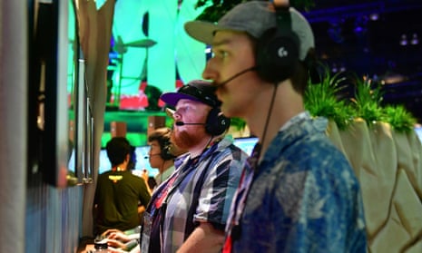 Gamers play Fortnite at the E3 gaming expo in Los Angeles.