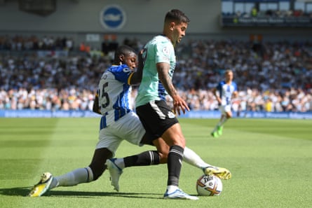 Moises Caicedo of Brighton tackles Newcastle United’s Bruno Guimarães